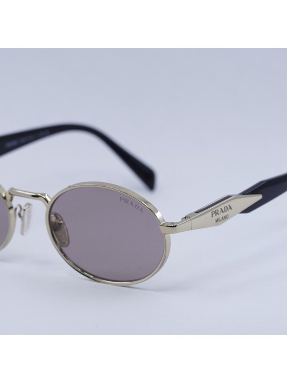 Prada PR65ZS ZVN20I Sunglasses Pale Gold Oval Frame, Light Purple Brown Lenses - Picture 4 of 12